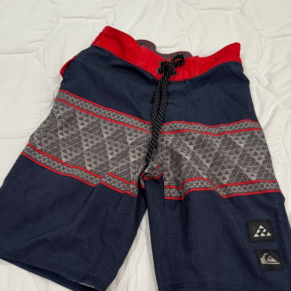 Quiksilver boys Red and Navy Board Shorts size 7